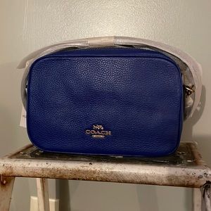 Brand new. Blue coach purse.